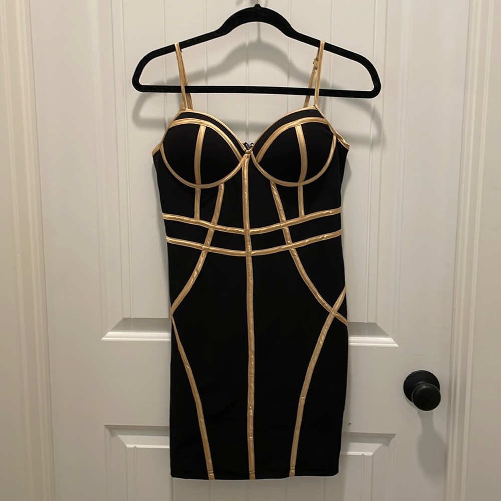 Classy, black, and gold cocktail dress.